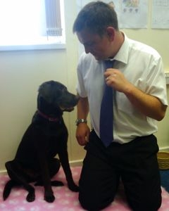Coco Chocolate Labrador and Adam Coco Chocolate Labrador with Adam