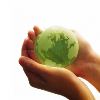 Planetsmall.jpg Photo of hands holding the Earth