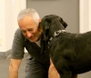 Roger Abrantes and Rottweiler.