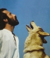 Roger Abrantes howling with husky in 1986 (photo by Ole Suszkievicz).
